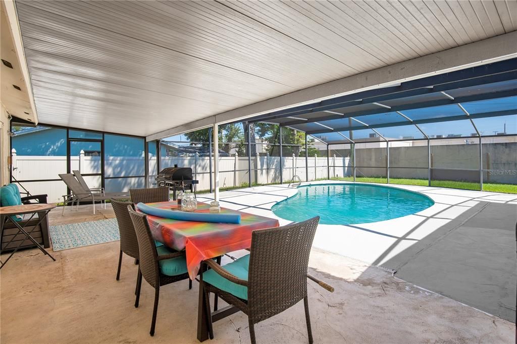 Expansive lanai overlooking the screened in pool.