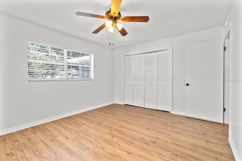 Bedroom 2 w/ Double BiFold Closet Doors