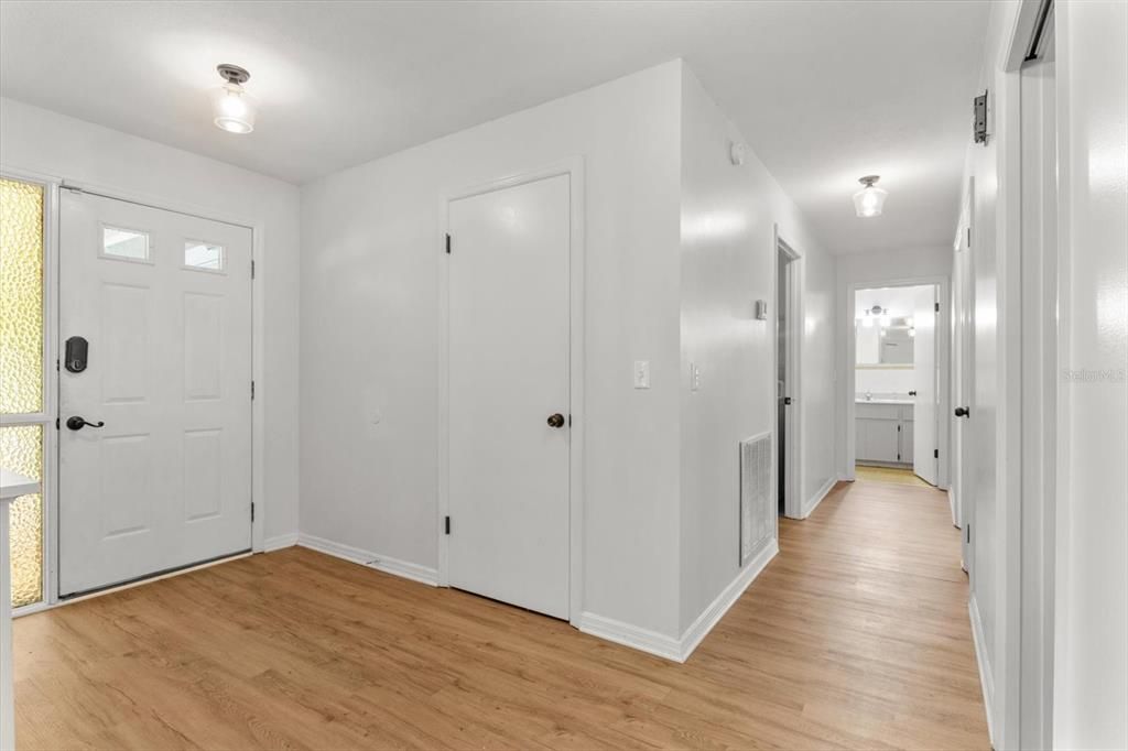 Foyer w/ Coat Closet...Hallway leads to Bedroom 2, Bathroom 2 & Laundry Room