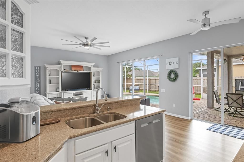 Kitchen view to second living room and outdoor