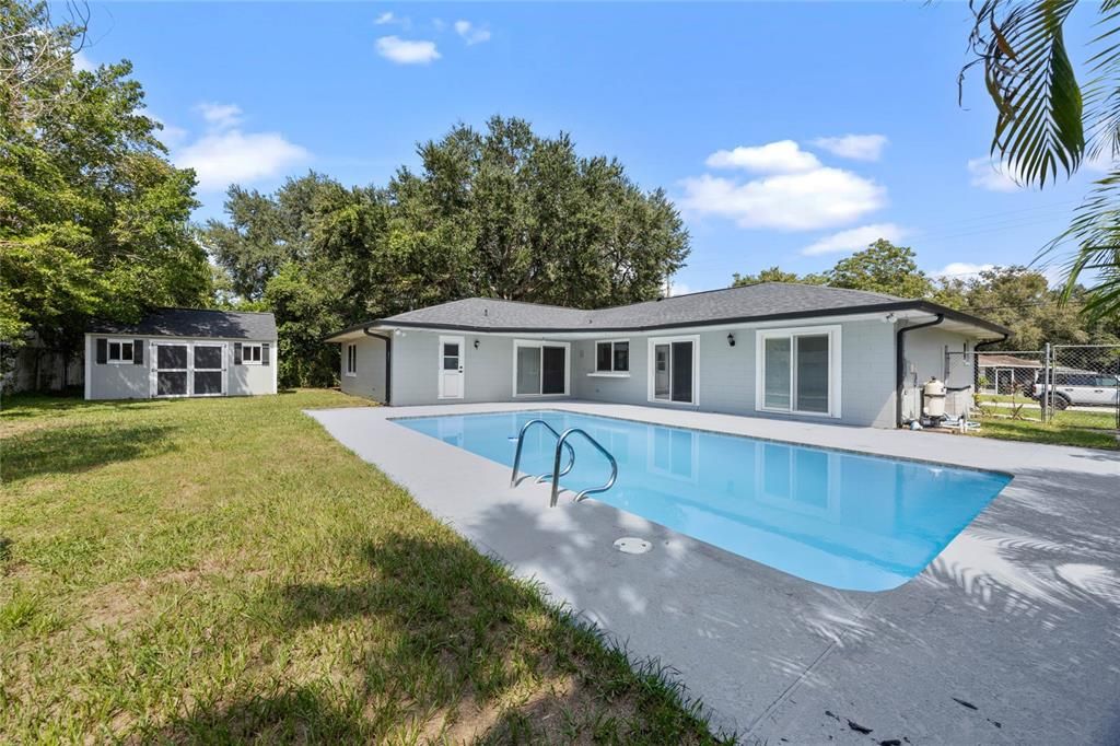 fenced backyard, pool and very nice shed