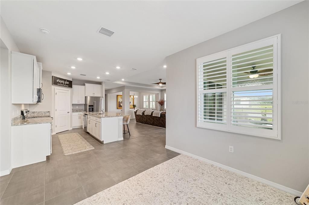 Breakfast room looking at open concept living