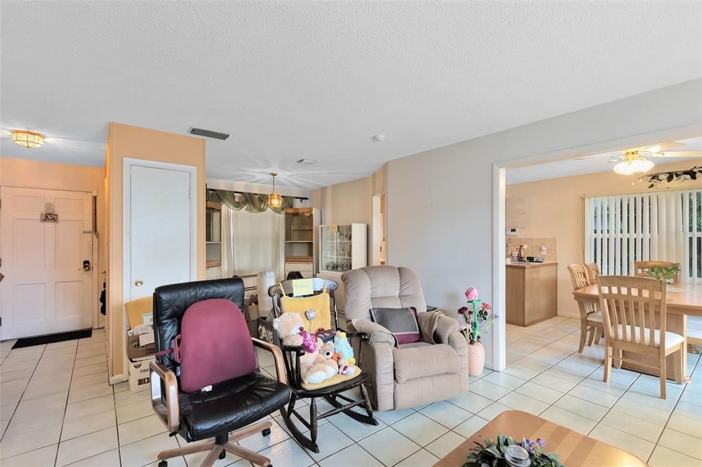 A lovely living room/dinette combo welcomes you inside.