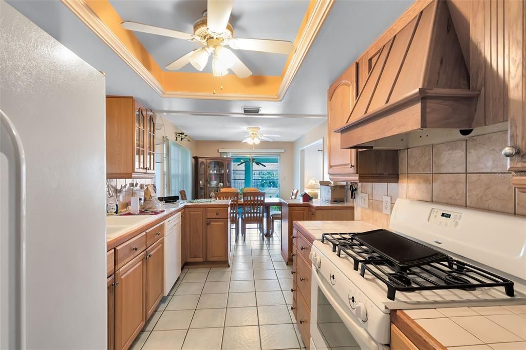 A view from the kitchen to the dining room.