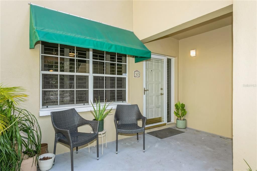 entryway, shared storage under stairs