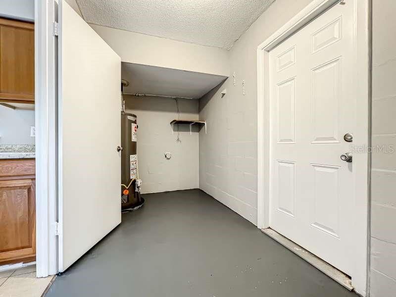 Laundry room with exit to exterior of home