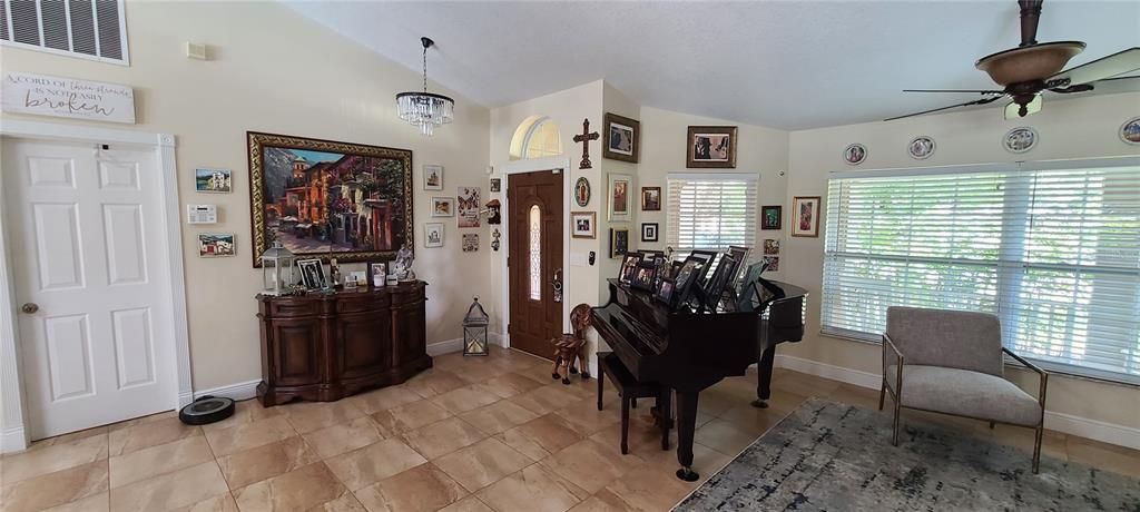 Inside view of the entrance door and living room.