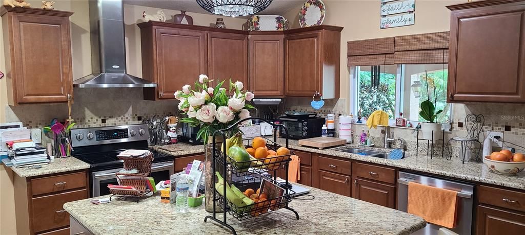 Kitchen with granite countertops.