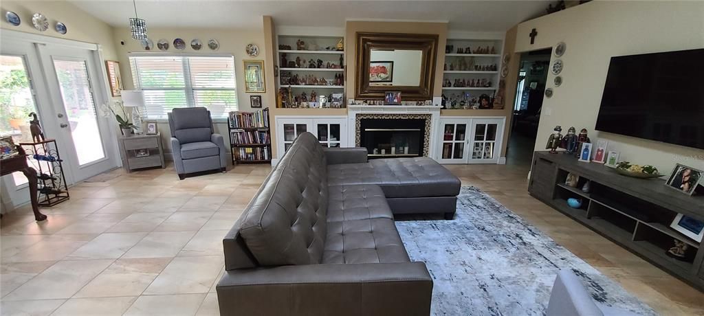 Inside view of the entrance door and living room.