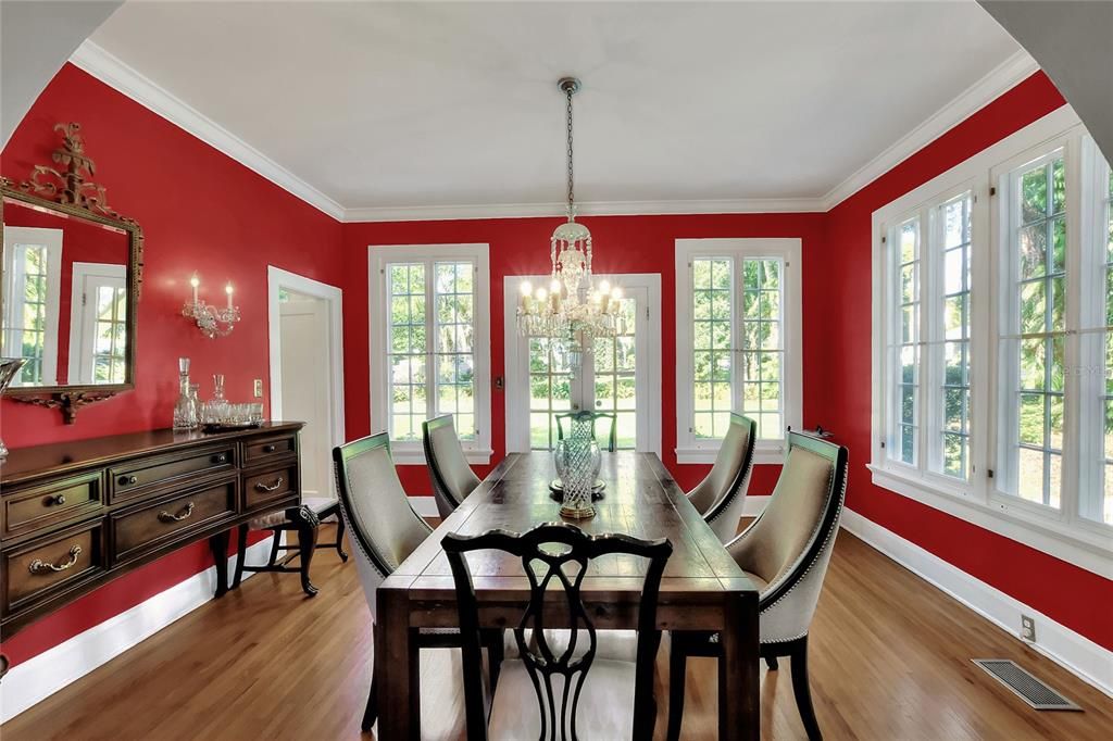 Crown molding and hardwood floors in the formal dining room.