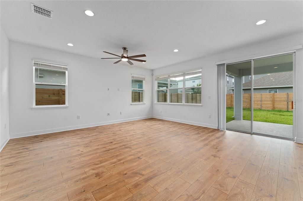 Family room with sliding glass doors to covered patio