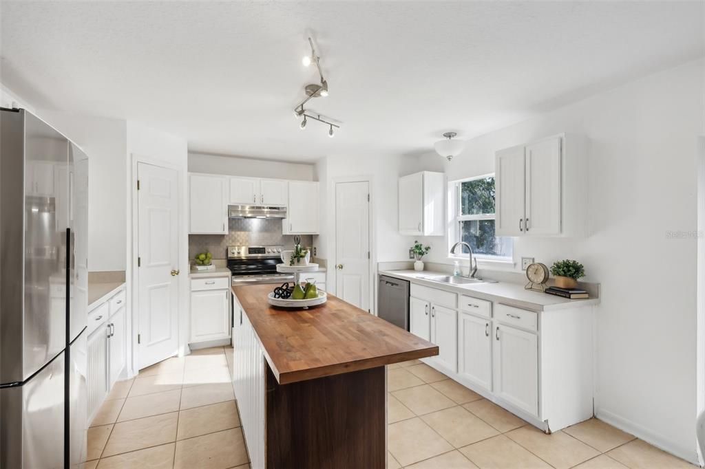 Kitchen with an island & double pantry's