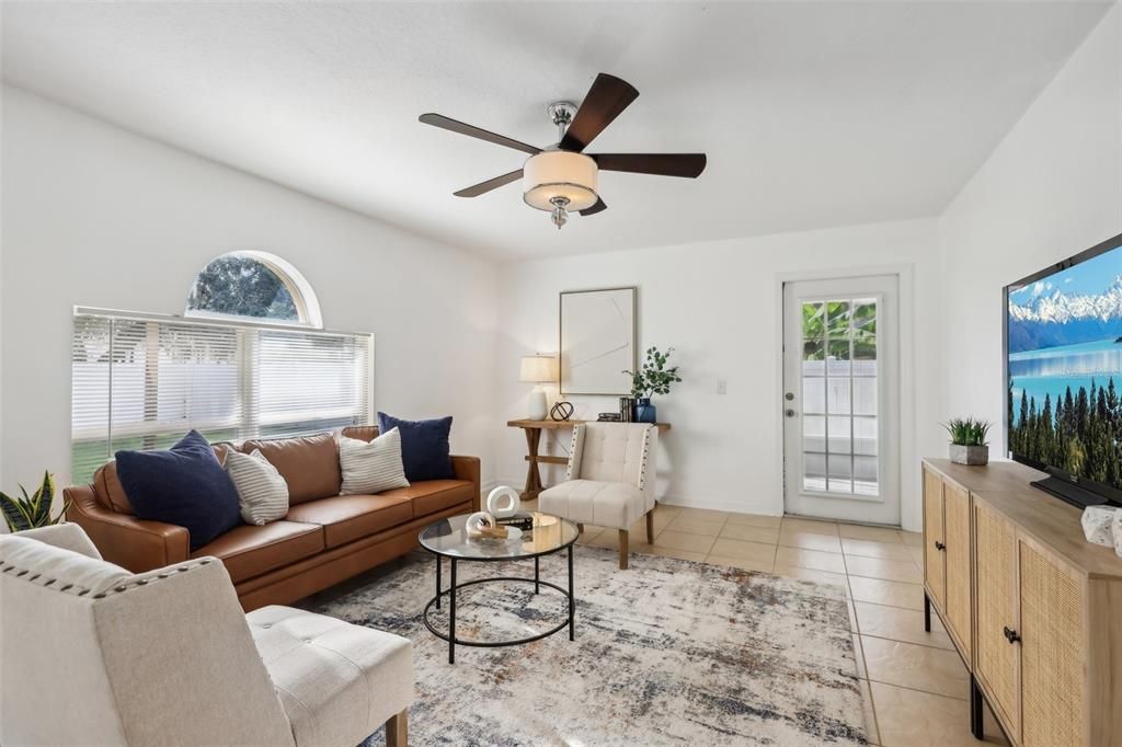 Family room with French Door to the screened in side patio