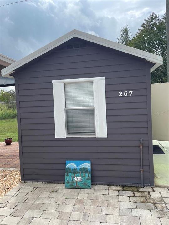 beautiful garden shed with double doors on back and side door