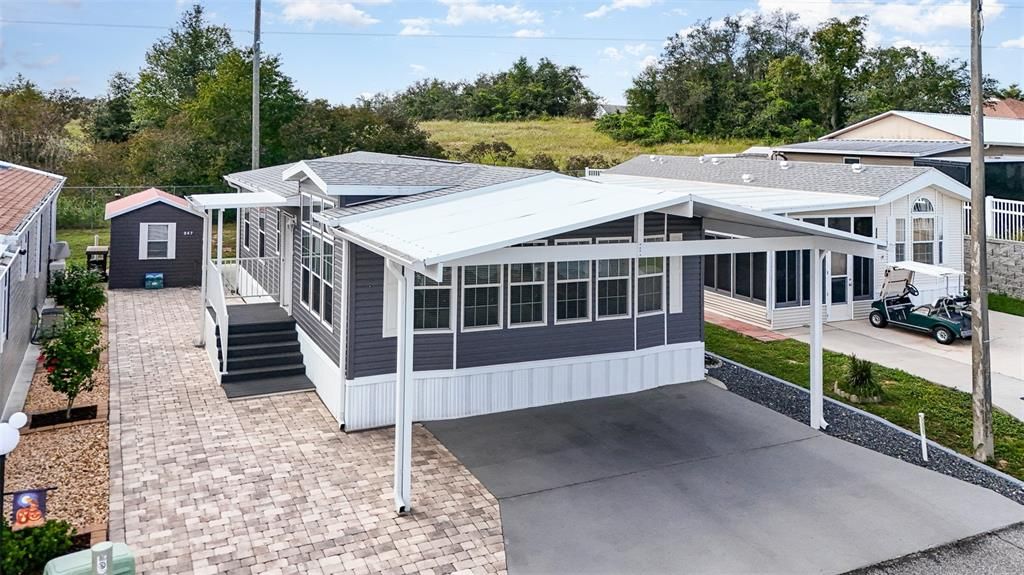 Spacious parking with additional paver side driveway