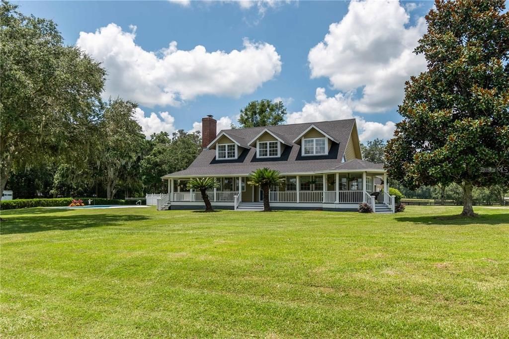 Nestled within Marion County's picturesque horse country, this beautifully designed farm spans nearly 40-acres of pristine, scenic countryside.