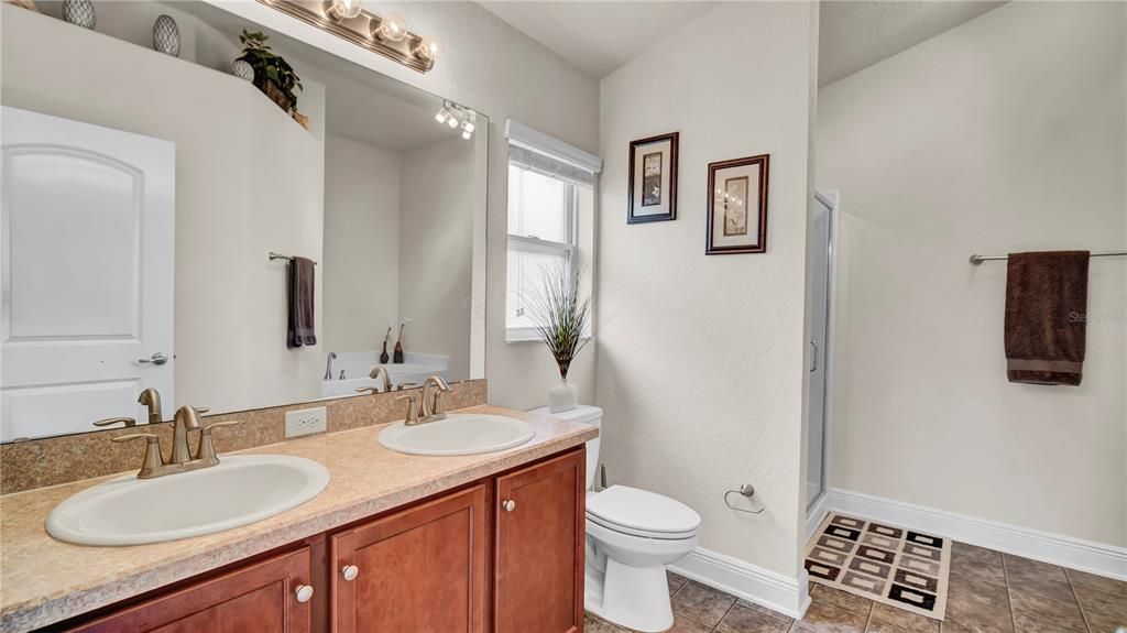 Master Bathroom with dual vanity sinks