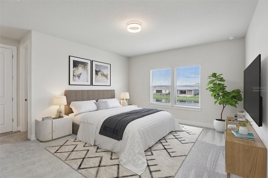 A generous PRIMARY SUITE is tucked away in one corner for a tranquil retreat for the homeowner with views of the water, a huge WALK-IN CLOSET and private en-suite bath. Virtually Staged.