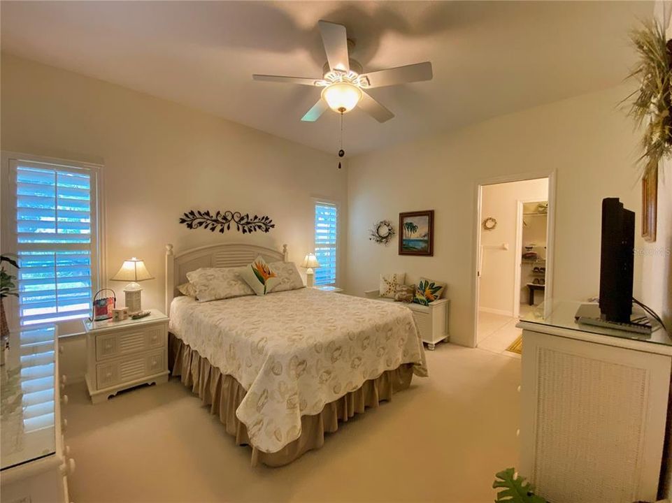 Primary Bedroom with Plantation Shutters & Carpet