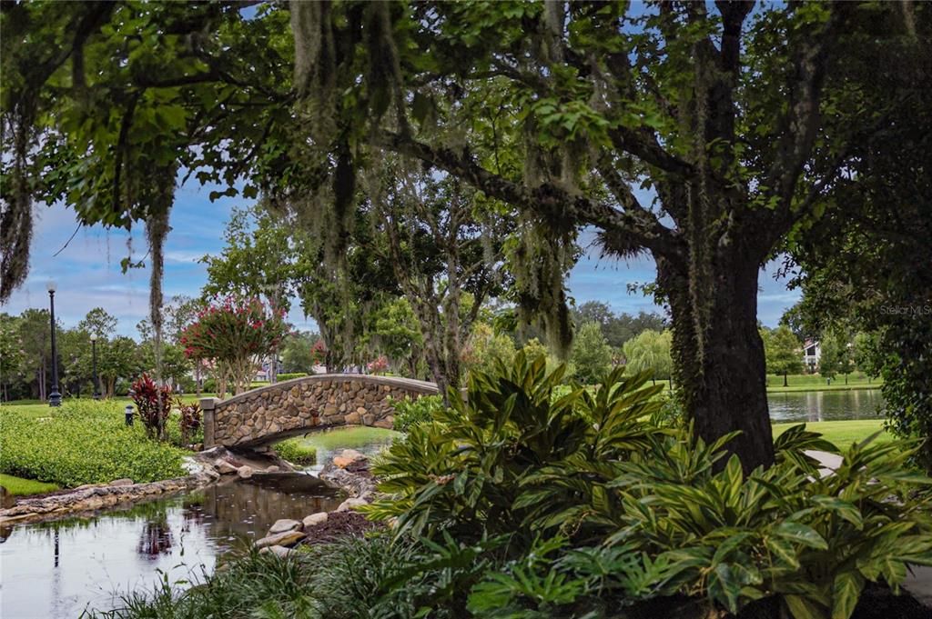 Tranquil Strolls Across A Stone Bridge