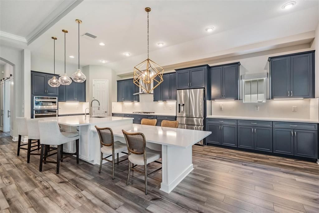 Quartz countertops and quartz backsplash with zero grout to clean!