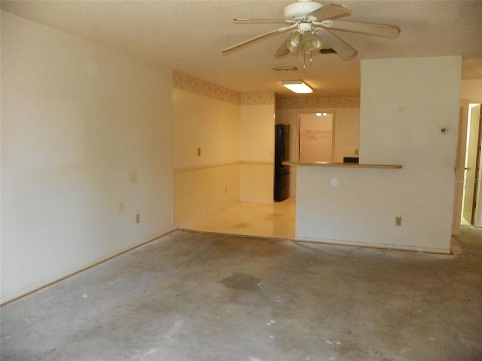 Living room looking into kitchen.