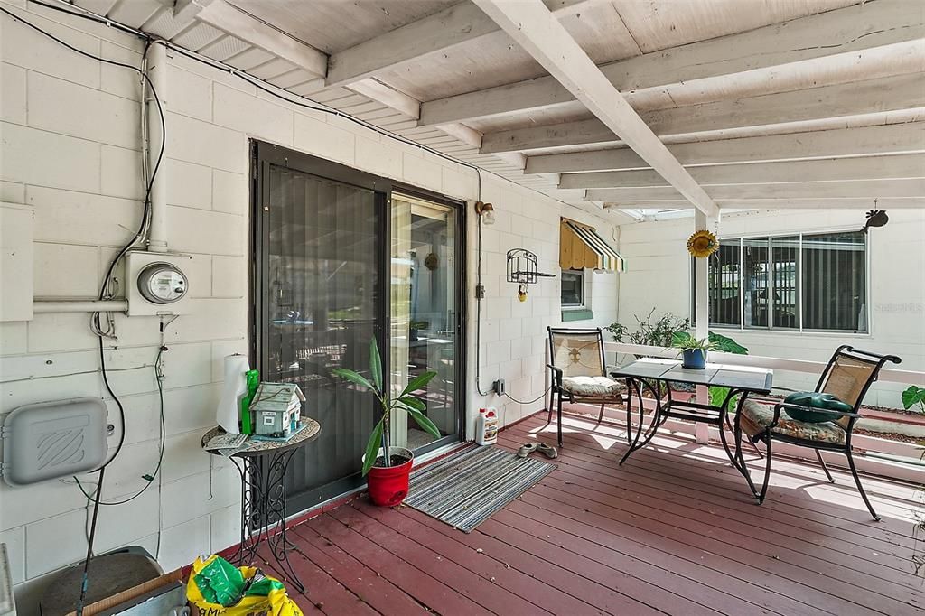 Sliding doors from Dining Room provide access to the patio