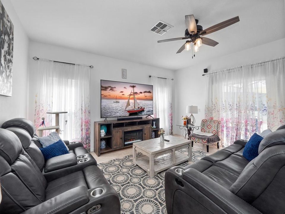 Spacious family room by the kitchen with relaxing view to the pool