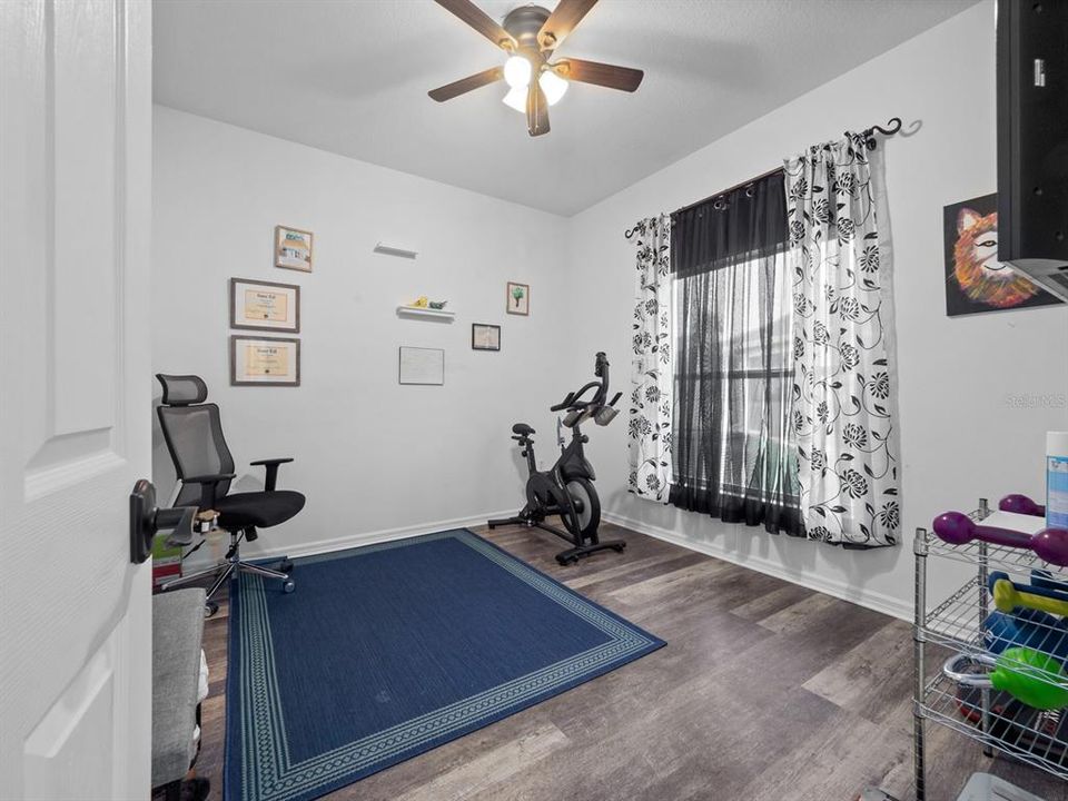 First floor bedroom used as workout room