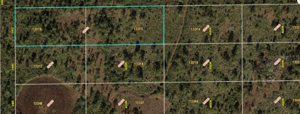 На продажу: $99,000 (2.47 acres)