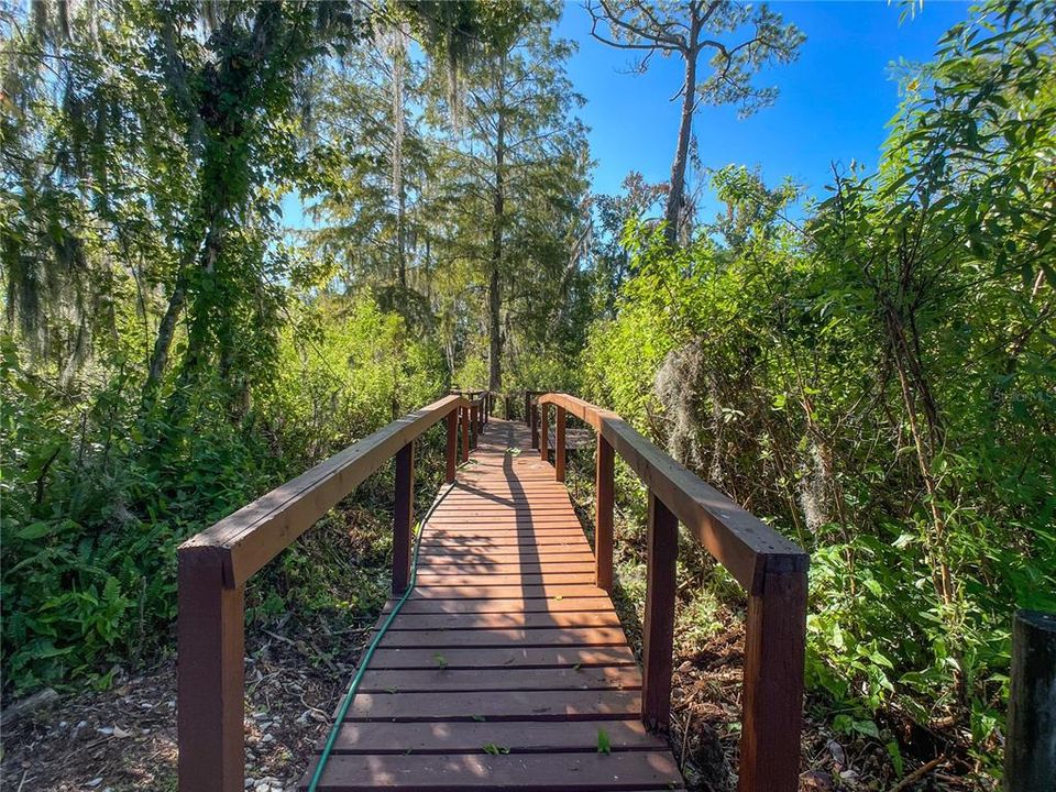 Refreshed and refurbished walkway to boat parking on the canal to Little Lake Harris