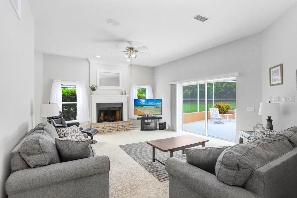 Family Room connected to kitchen with Pocket Slider doors to pool