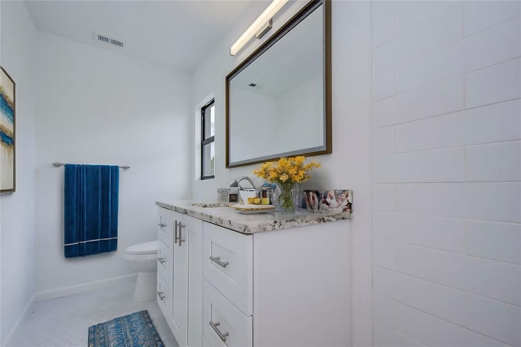 Primary bathroom staged