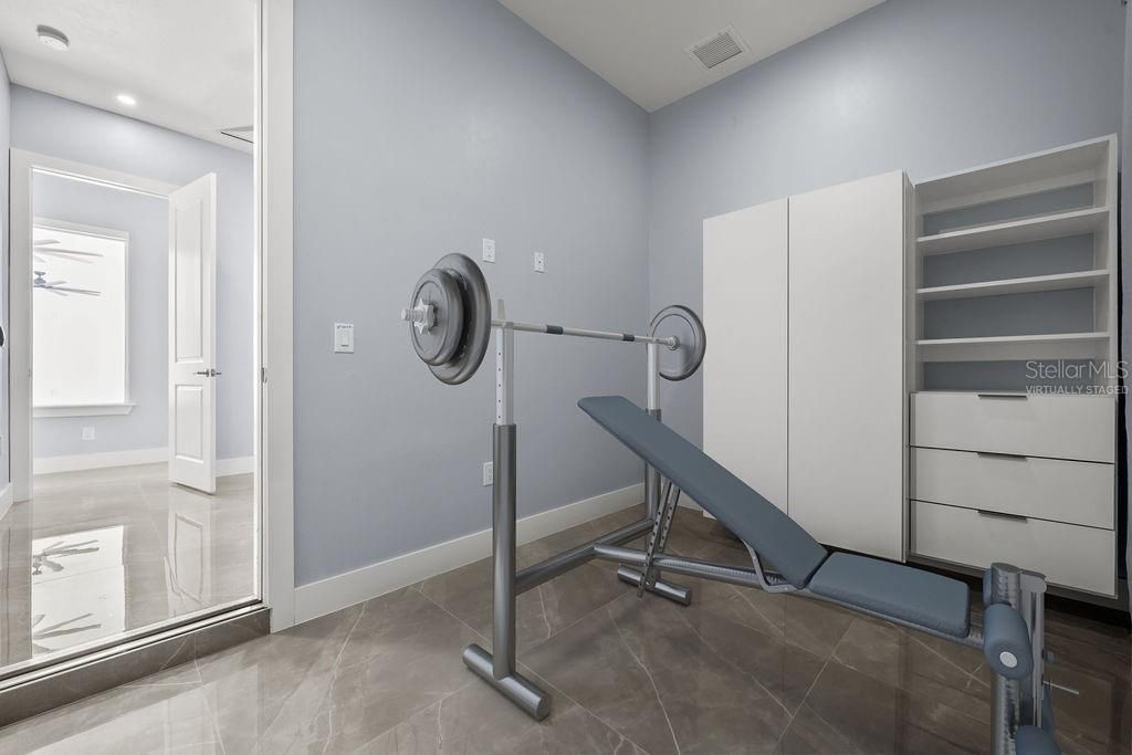 Bonus Room behind office, perfect for a work out room or hobby room Virtually Staged