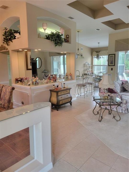 foyer looking into kitchen and breakfast nook