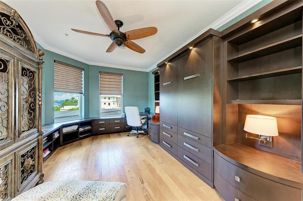 Built-in Desk, Drawers, Computer Station and Murphy Bed in Loft Area with view to the water and sunsets