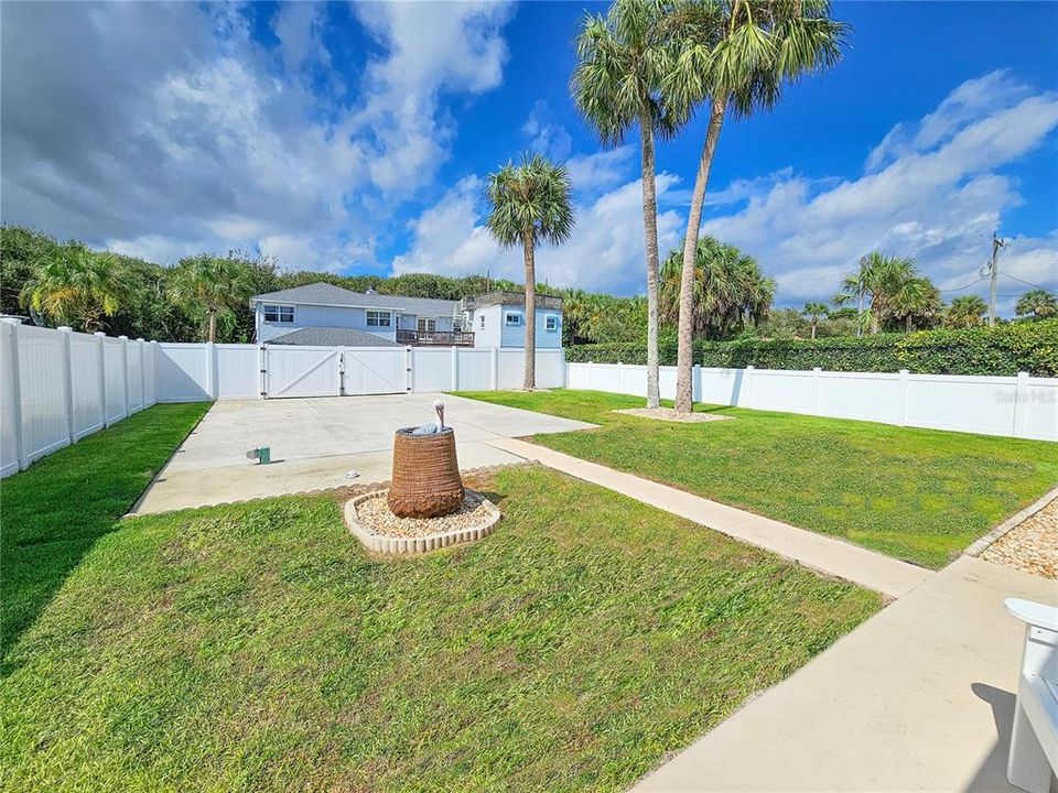 Double gates lead to rear alley access.