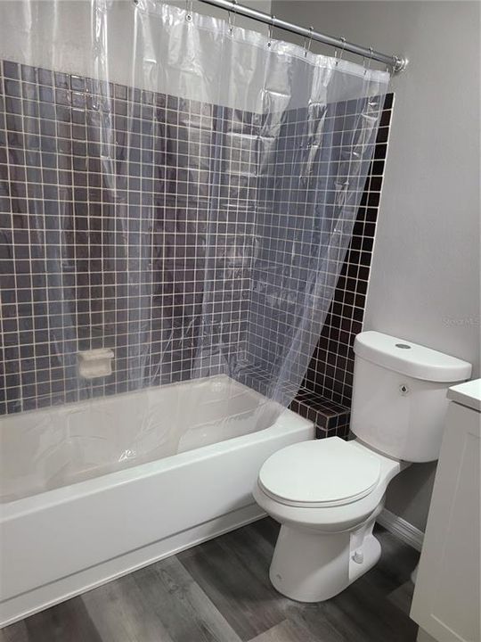 GUEST BATH WITH TUB AND SHOWER