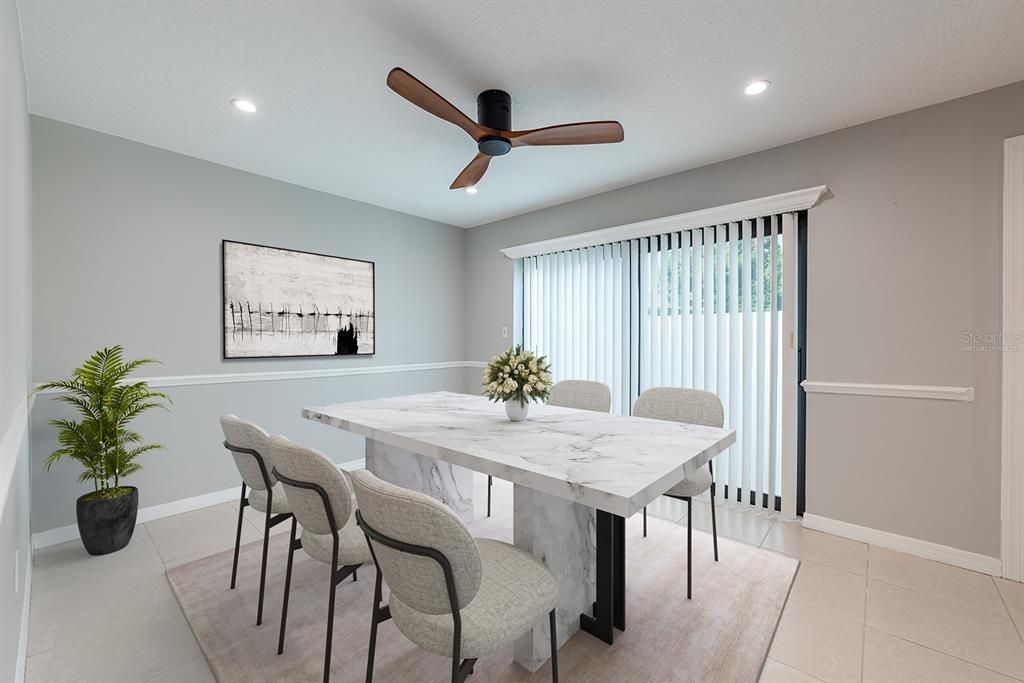 The floorplan flows from living to dining with oversized sliding glass doors that open up to the PRIVATE PATIO making gathering with family and entertaining friends a breeze! Virtually Staged.