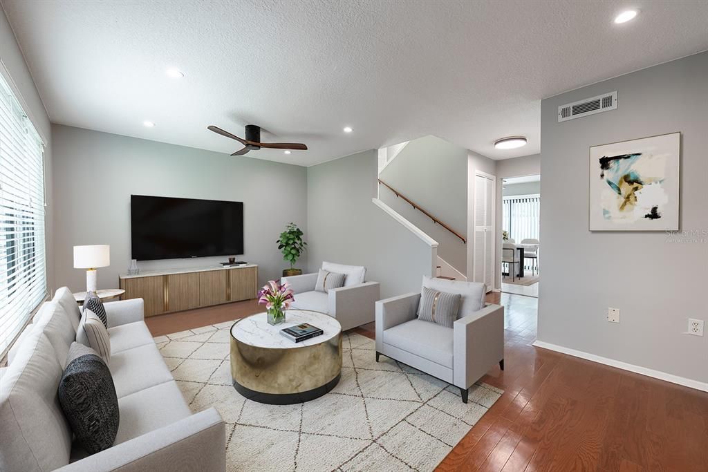 The foyer opens up to a spacious living area Virtually Staged.