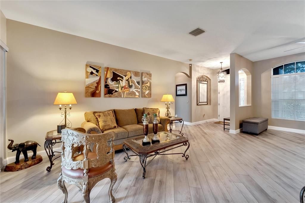 Formal Living Room w/view of the Front Door and Foyer