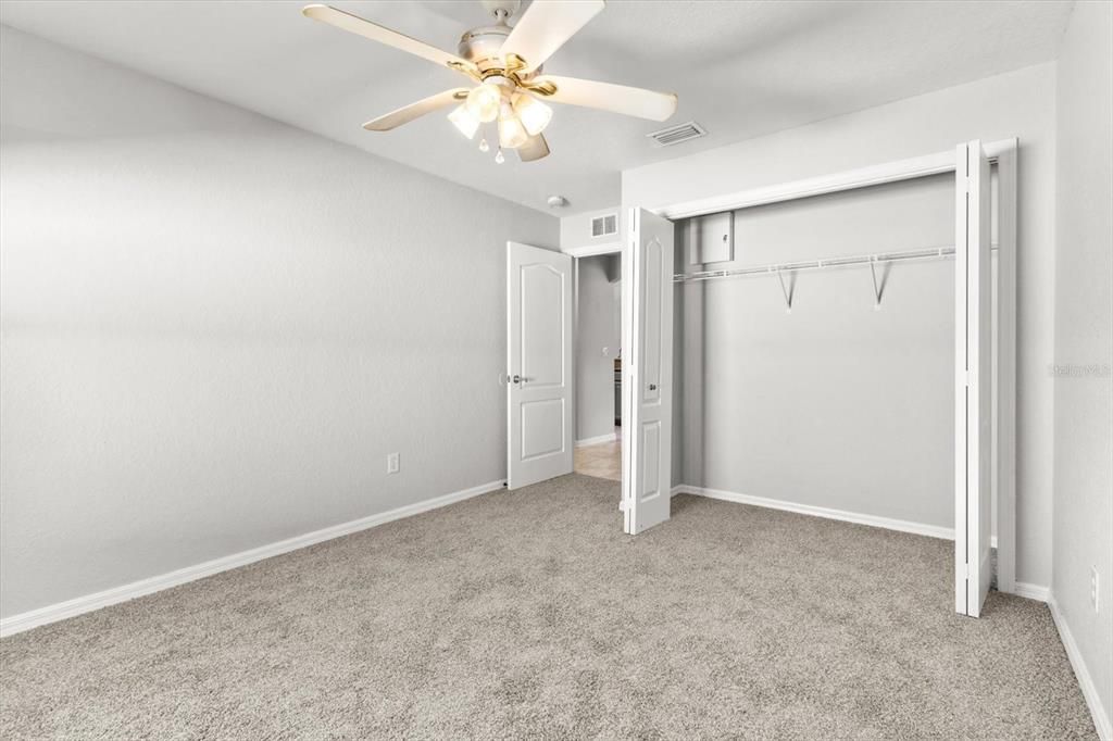 Bedroom 2 w/ NEW Carpeting & Double Bifold Closet Doors