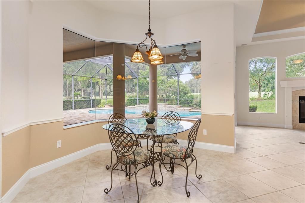 Dining area in Kitchen w/ pool-golf views