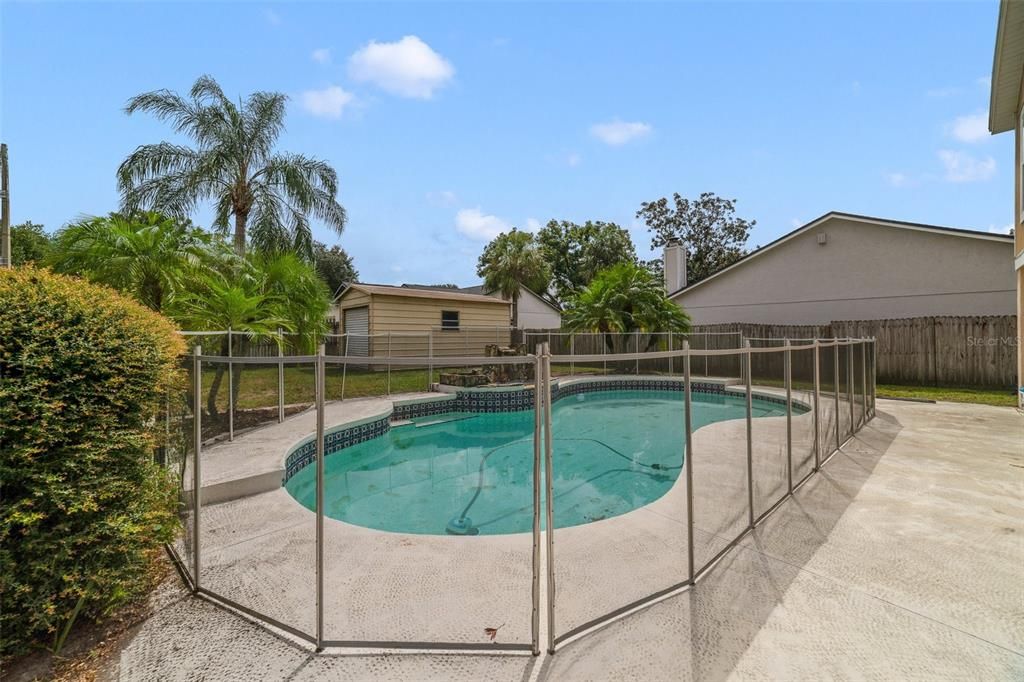 Spend your Summers poolside, it comes with a safety fence and rock feature and there is a STEEL SHED/WORKSHOP for all your storage needs.