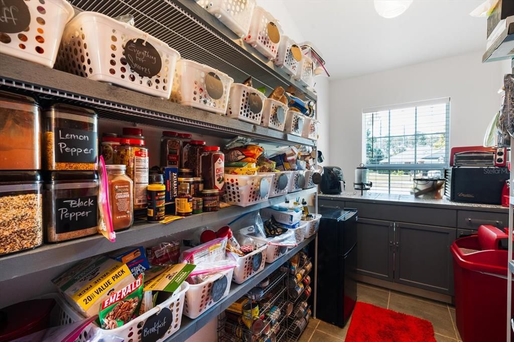 pantry with a window giving it so much light!