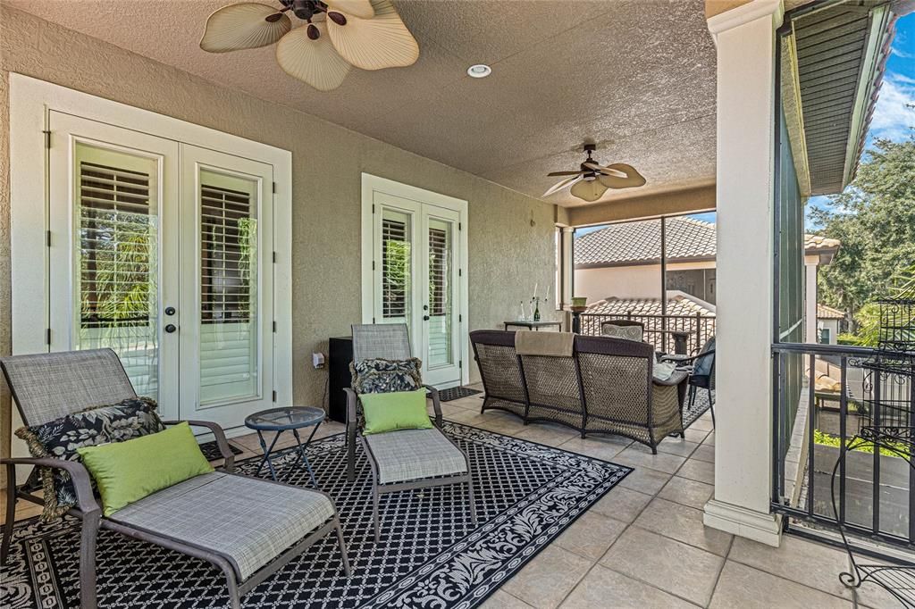 Upstairs screened in balcony overlooking golf course