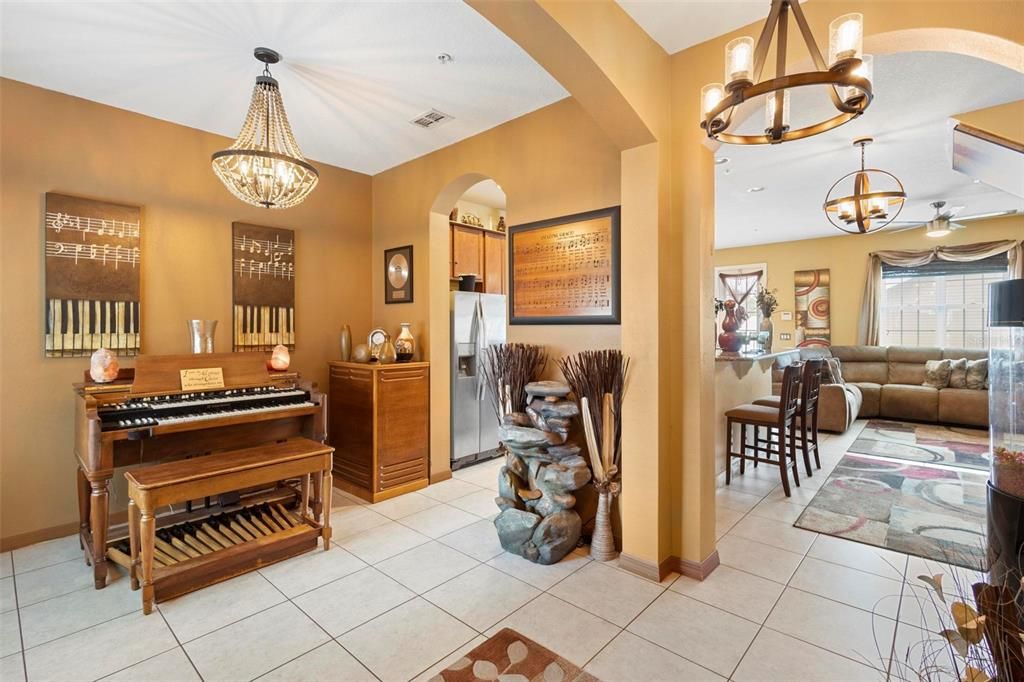 Upon entry, view of formal dining and living space