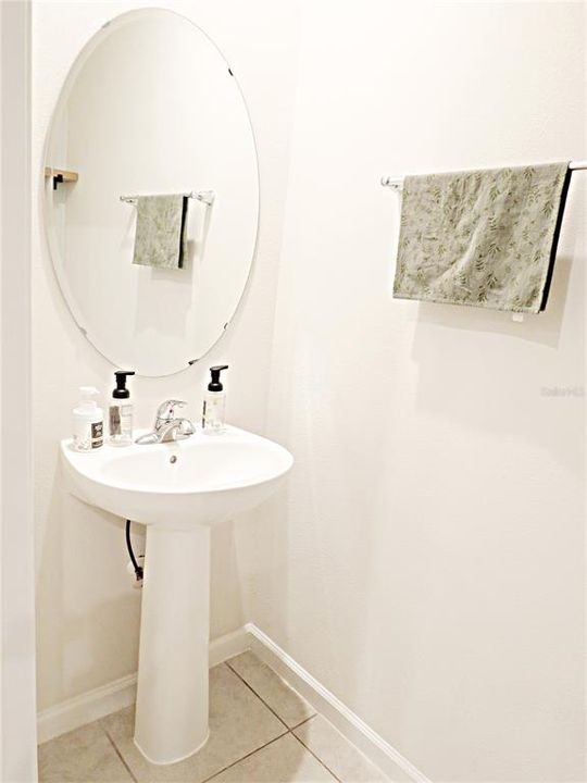 There is a powder room located downstairs provides convenience