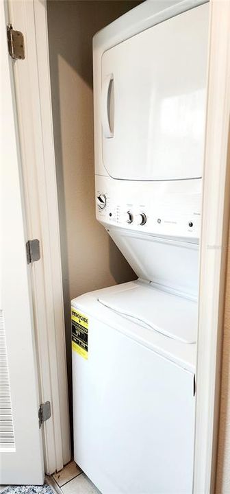 Stackable washer and dryer located upstairs