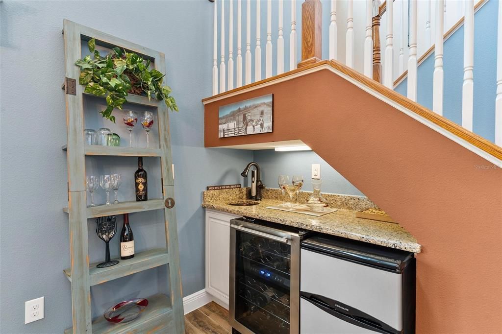 Formal Dining Area with Wet Bar, Wine Refrigerator, and Mini Fridge